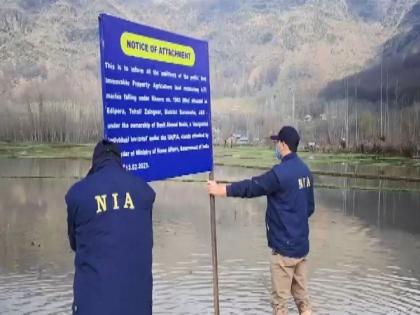 J-K: NIA attaches properties of Hizb-ul-Mujahideen terrorist Basit Reshi | J-K: NIA attaches properties of Hizb-ul-Mujahideen terrorist Basit Reshi J-K: NIA attaches properties of Hizb-ul-Mujahideen terrorist Basit Reshi | J-K: NIA attaches properties of Hizb-ul-Mujahideen terrorist Basit Reshi
