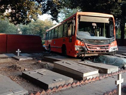 Delhi: DTC bus crashes into Christian cemetery, damages wall | Delhi: DTC bus crashes into Christian cemetery, damages wall