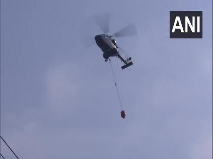 Kochi: Indian Navy helicopters deployed to extinguish fire at Brahmapuram waste plant | Kochi: Indian Navy helicopters deployed to extinguish fire at Brahmapuram waste plant