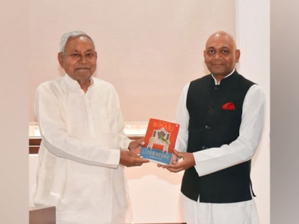 Poet-diplomat Abhay K presents copy of 'The Book of Bihari Literature' to Nitish Kumar | Poet-diplomat Abhay K presents copy of 'The Book of Bihari Literature' to Nitish Kumar