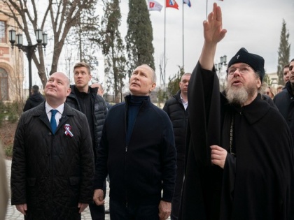 Putin visits Crimea on anniversary of its annexation from Ukraine | Putin visits Crimea on anniversary of its annexation from Ukraine