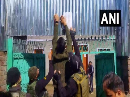 J-K: Police attach properties of two Over Ground Workers in Bandipora | J-K: Police attach properties of two Over Ground Workers in Bandipora