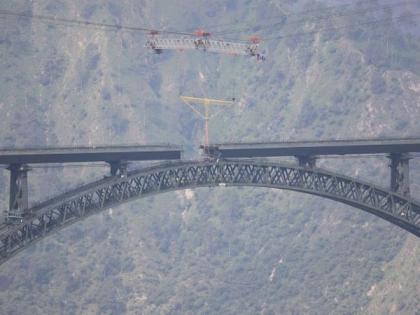 Small test train runs on 'world's highest railway bridge track' on Chenab River | Small test train runs on 'world's highest railway bridge track' on Chenab River Small test train runs on 'world's highest railway bridge track' on Chenab River | Small test train runs on 'world's highest railway bridge track' on Chenab River