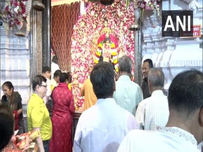 Devotees offer prayers at Delhi's Chhatarpur Temple on eighth day of Navratri | Devotees offer prayers at Delhi's Chhatarpur Temple on eighth day of Navratri