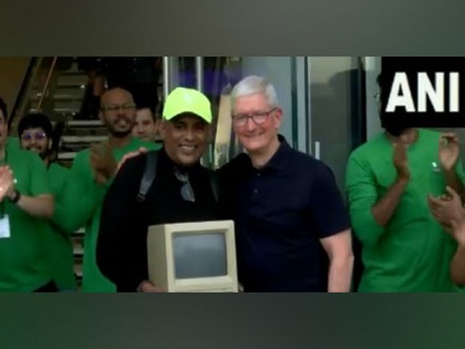 Apple CEO Tim Cook gives priceless reaction at seeing Macintosh Classic machine after opening first India store | Apple CEO Tim Cook gives priceless reaction at seeing Macintosh Classic machine after opening first India store