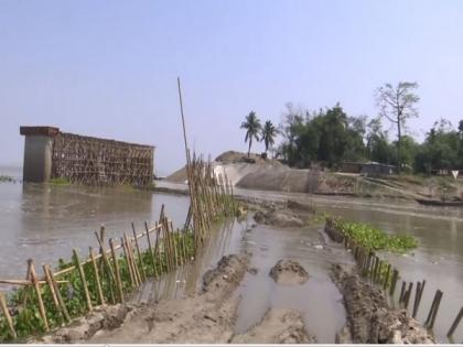 Assam: Hundreds of families under existential crisis as Brahmaputra engulfs entire village | Assam: Hundreds of families under existential crisis as Brahmaputra engulfs entire village Assam: Hundreds of families under existential crisis as Brahmaputra engulfs entire village | Assam: Hundreds of families under existential crisis as Brahmaputra engulfs entire village