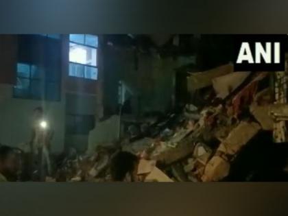 Three storeyed building collapses in Gujarat's Ahmedabad | Three storeyed building collapses in Gujarat's Ahmedabad