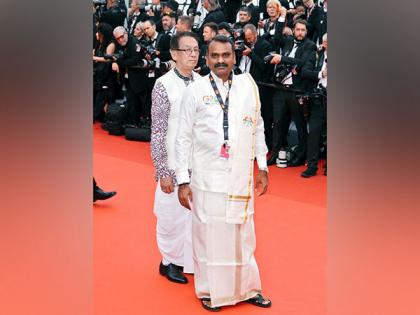 Union Minister L Murugan unveils 54th International Film Festival of India's official poster at Cannes | Union Minister L Murugan unveils 54th International Film Festival of India's official poster at Cannes