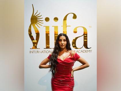 IIFA Rocks 2023: Nora Fatehi turns up the heat in red hot dress | IIFA Rocks 2023: Nora Fatehi turns up the heat in red hot dress