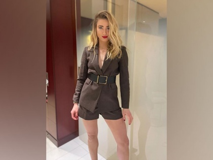 Amber Heard denies quitting Hollywood, says "I keep moving forward" | Amber Heard denies quitting Hollywood, says "I keep moving forward"