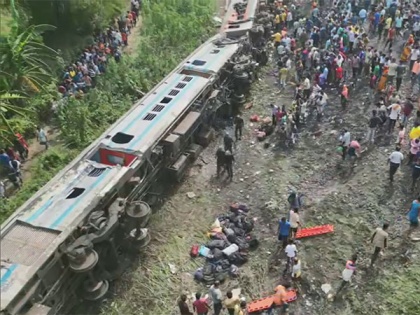 Odisha train mishap captured in pictures- Mangled coaches, attempts to rescue trapped passengers | Odisha train mishap captured in pictures- Mangled coaches, attempts to rescue trapped passengers