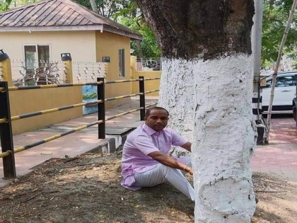 Assam: Congress MLA stages protest over electricity bill, sits under tree near Speaker's residence | Assam: Congress MLA stages protest over electricity bill, sits under tree near Speaker's residence