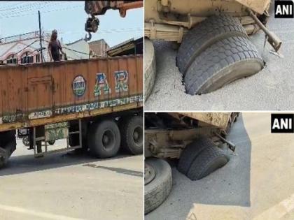Bihar: Container truck gets stuck after road caves in Patna; netizens react | Bihar: Container truck gets stuck after road caves in Patna; netizens react