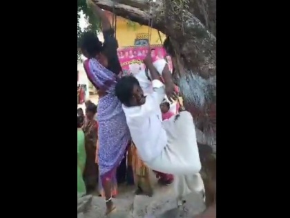 Couple tortured, tied to tree over alleged black magic in Telangana's Sangareddy | Couple tortured, tied to tree over alleged black magic in Telangana's Sangareddy