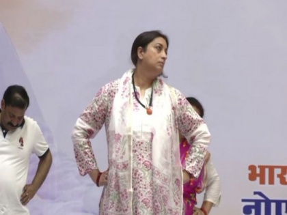 International Yoga Day: Union Minister Smriti Irani performs yoga at Noida indoor stadium in UP | International Yoga Day: Union Minister Smriti Irani performs yoga at Noida indoor stadium in UP