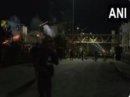 Manipur Police uses tear gas to disperse crowd gathered near BJP office in Imphal | Manipur Police uses tear gas to disperse crowd gathered near BJP office in Imphal