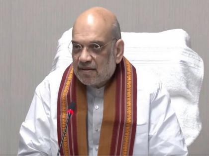 Amit Shah transfers Rs 10,000 each to 112 Sahara investors in first tranche | Amit Shah transfers Rs 10,000 each to 112 Sahara investors in first tranche