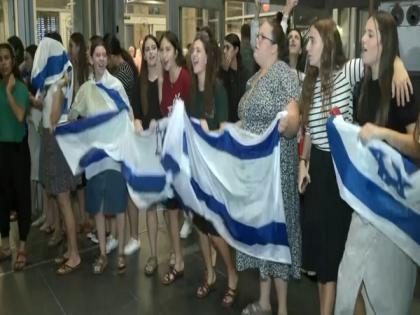 Israelis celebrate at Tel Aviv airport as they welcome citizens, soldiers | Israelis celebrate at Tel Aviv airport as they welcome citizens, soldiers Israelis celebrate at Tel Aviv airport as they welcome citizens, soldiers | Israelis celebrate at Tel Aviv airport as they welcome citizens, soldiers