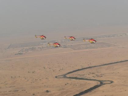 Indian Air Force's Sarang Helicopter team and Tejas Jet impress at Dubai Air Show | Indian Air Force's Sarang Helicopter team and Tejas Jet impress at Dubai Air Show Indian Air Force's Sarang Helicopter team and Tejas Jet impress at Dubai Air Show | Indian Air Force's Sarang Helicopter team and Tejas Jet impress at Dubai Air Show