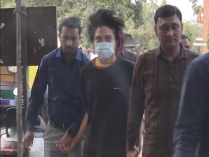 Pro-Palestine fan who breached security at Ahmedabad to meet Kohli produced before Court | Pro-Palestine fan who breached security at Ahmedabad to meet Kohli produced before Court Pro-Palestine fan who breached security at Ahmedabad to meet Kohli produced before Court | Pro-Palestine fan who breached security at Ahmedabad to meet Kohli produced before Court