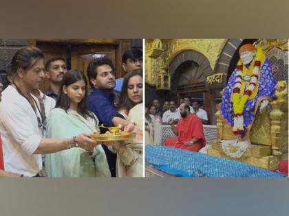 Shah Rukh Khan performs pooja at Sai Baba temple in Shirdi with daughter Suhana | Shah Rukh Khan performs pooja at Sai Baba temple in Shirdi with daughter Suhana Shah Rukh Khan performs pooja at Sai Baba temple in Shirdi with daughter Suhana | Shah Rukh Khan performs pooja at Sai Baba temple in Shirdi with daughter Suhana