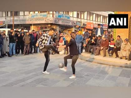 Freestyle footballers Aguska, Patrick display football juggling skills at Lal Chowk in Srinagar | Freestyle footballers Aguska, Patrick display football juggling skills at Lal Chowk in Srinagar