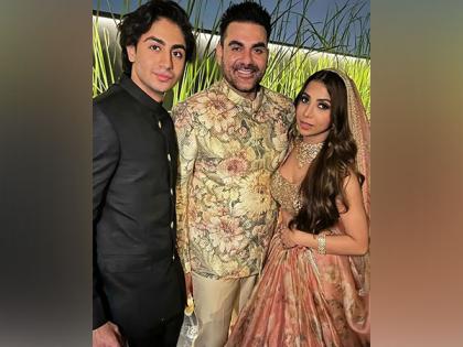 Newlyweds Arbaaz, Shura pose with son Arhaan at wedding ceremony | Newlyweds Arbaaz, Shura pose with son Arhaan at wedding ceremony Newlyweds Arbaaz, Shura pose with son Arhaan at wedding ceremony | Newlyweds Arbaaz, Shura pose with son Arhaan at wedding ceremony