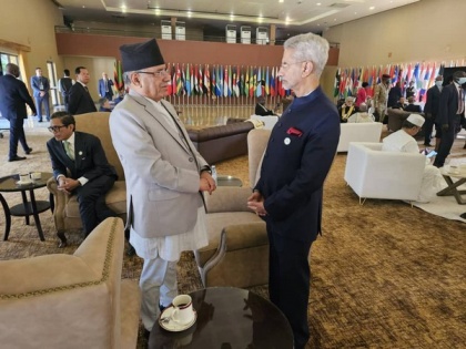 EAM Jaishankar meets Nepal PM on sidelines of 19th NAM Summit | EAM Jaishankar meets Nepal PM on sidelines of 19th NAM Summit