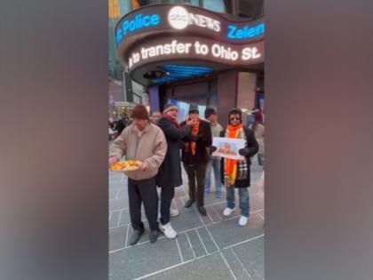 US: 'Overseas Friends of Ram Mandir' distributes laddoos at Times Square ahead of Pran Pratishtha | US: 'Overseas Friends of Ram Mandir' distributes laddoos at Times Square ahead of Pran Pratishtha US: 'Overseas Friends of Ram Mandir' distributes laddoos at Times Square ahead of Pran Pratishtha | US: 'Overseas Friends of Ram Mandir' distributes laddoos at Times Square ahead of Pran Pratishtha