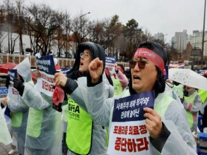 S Korea: Govt threatens striking doctors with indictment, suspension if they don't report to work within deadline | S Korea: Govt threatens striking doctors with indictment, suspension if they don't report to work within deadline S Korea: Govt threatens striking doctors with indictment, suspension if they don't report to work within deadline | S Korea: Govt threatens striking doctors with indictment, suspension if they don't report to work within deadline