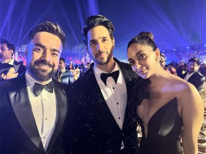Rashid Khan poses with Sidharth Malhotra, Kiara Advani at Anant-Radhika's pre-wedding festivities | Rashid Khan poses with Sidharth Malhotra, Kiara Advani at Anant-Radhika's pre-wedding festivities Rashid Khan poses with Sidharth Malhotra, Kiara Advani at Anant-Radhika's pre-wedding festivities | Rashid Khan poses with Sidharth Malhotra, Kiara Advani at Anant-Radhika's pre-wedding festivities