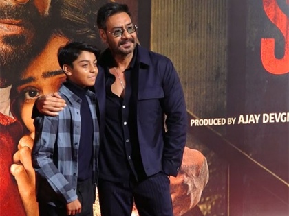 Ajay Devgn poses with son Yug at screening of his film 'Shaitaan' | Ajay Devgn poses with son Yug at screening of his film 'Shaitaan'