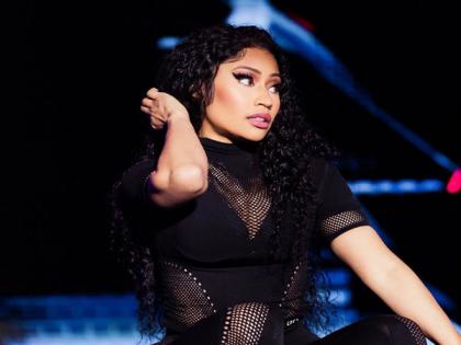 Nicki Minaj gets hit by object on stage, throws it back into crowd | Nicki Minaj gets hit by object on stage, throws it back into crowd
