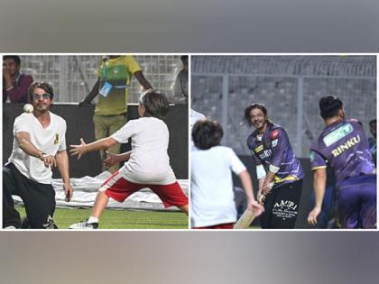 IPL: Shah Rukh Khan flaunts his batting skills as he plays cricket with son AbRam at Eden Gardens | IPL: Shah Rukh Khan flaunts his batting skills as he plays cricket with son AbRam at Eden Gardens