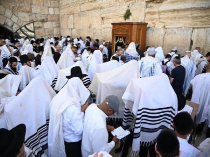 'The people of Israel need the blessings now more than ever': Jews flock to Western Wall | 'The people of Israel need the blessings now more than ever': Jews flock to Western Wall