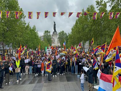 Paris: Campaigners for Tibet, Xinjiang protest as Chinese president Xi Jinping arrives in France | Paris: Campaigners for Tibet, Xinjiang protest as Chinese president Xi Jinping arrives in France