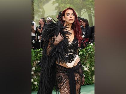 Met Gala: Dua Lipa strikes a pose in black lace gown | Met Gala: Dua Lipa strikes a pose in black lace gown