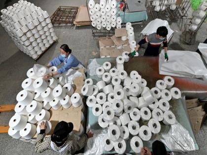 US bans 26 textile firms over alleged links to forced labour in China | US bans 26 textile firms over alleged links to forced labour in China
