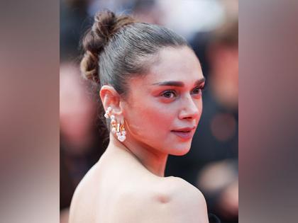 Cannes Film Festival 2024: Aditi Rao Hydari Grabs Eyeballs on Red Carpet in Monochrome Gown (See Pics) | Cannes Film Festival 2024: Aditi Rao Hydari Grabs Eyeballs on Red Carpet in Monochrome Gown (See Pics)