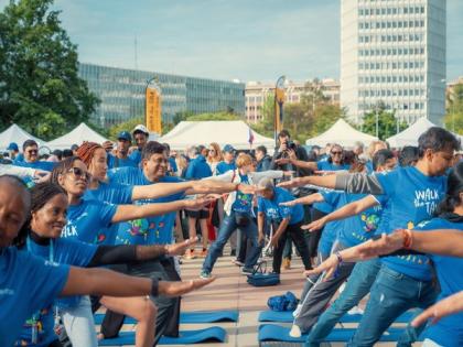 WHO Chief, Union Health Secy perform yoga at 'Walk the Talk' event in Geneva ahead of International Yoga Day | WHO Chief, Union Health Secy perform yoga at 'Walk the Talk' event in Geneva ahead of International Yoga Day