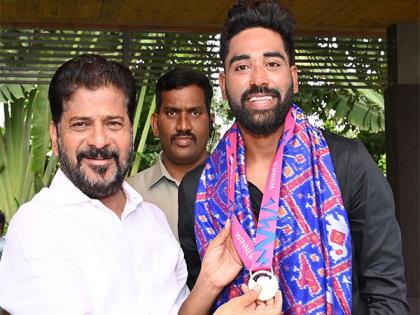 India seamer Mohammed Siraj meets CM Revanth Reddy after T20 WC triumph | India seamer Mohammed Siraj meets CM Revanth Reddy after T20 WC triumph