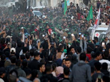 Israel halts Palestinian prisoners' release after 'chaotic' scenes during hostage release, confirms receiving security assurance later | Israel halts Palestinian prisoners' release after 'chaotic' scenes during hostage release, confirms receiving security assurance later Israel halts Palestinian prisoners' release after 'chaotic' scenes during hostage release, confirms receiving security assurance later | Israel halts Palestinian prisoners' release after 'chaotic' scenes during hostage release, confirms receiving security assurance later