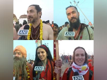 Foreign devotees take holy dip at Triveni Sangam, call it 'experience beyond words' | Foreign devotees take holy dip at Triveni Sangam, call it 'experience beyond words' Foreign devotees take holy dip at Triveni Sangam, call it 'experience beyond words' | Foreign devotees take holy dip at Triveni Sangam, call it 'experience beyond words'