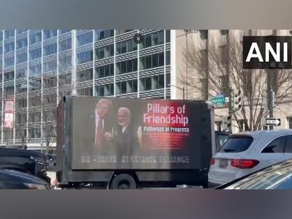 US: Mobile billboard advertising truck displays boards featuring pictures of PM Modi, Trump | US: Mobile billboard advertising truck displays boards featuring pictures of PM Modi, Trump US: Mobile billboard advertising truck displays boards featuring pictures of PM Modi, Trump | US: Mobile billboard advertising truck displays boards featuring pictures of PM Modi, Trump