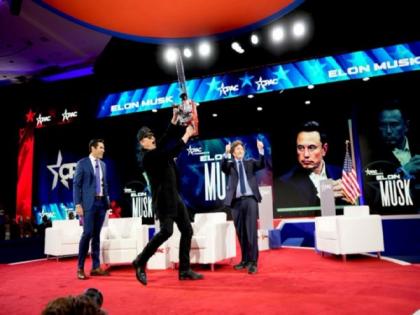 Elon Musk, joined by Argentine President Javier Milei, wields chainsaw at CPAC | Elon Musk, joined by Argentine President Javier Milei, wields chainsaw at CPAC