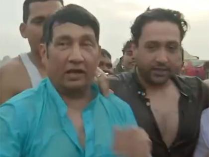 Shekhar Suman, son Adhyayan take holy dip at Maha Kumbh | Shekhar Suman, son Adhyayan take holy dip at Maha Kumbh Shekhar Suman, son Adhyayan take holy dip at Maha Kumbh | Shekhar Suman, son Adhyayan take holy dip at Maha Kumbh