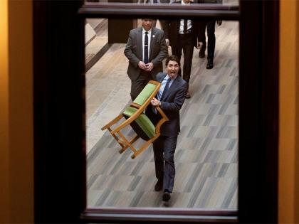 A tongue-in-cheek farewell: Justin Trudeau exits Parliament with chair in hand | A tongue-in-cheek farewell: Justin Trudeau exits Parliament with chair in hand A tongue-in-cheek farewell: Justin Trudeau exits Parliament with chair in hand | A tongue-in-cheek farewell: Justin Trudeau exits Parliament with chair in hand