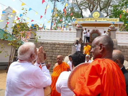 In Lanka, PM Modi offers prayers at revered Mahabodhi tree at Anuradhapura | In Lanka, PM Modi offers prayers at revered Mahabodhi tree at Anuradhapura In Lanka, PM Modi offers prayers at revered Mahabodhi tree at Anuradhapura | In Lanka, PM Modi offers prayers at revered Mahabodhi tree at Anuradhapura