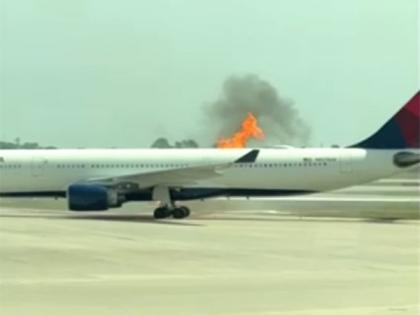 US: Delta plane catches fire at Orlando Airport, passengers evacuated on emergency slides | US: Delta plane catches fire at Orlando Airport, passengers evacuated on emergency slides US: Delta plane catches fire at Orlando Airport, passengers evacuated on emergency slides | US: Delta plane catches fire at Orlando Airport, passengers evacuated on emergency slides