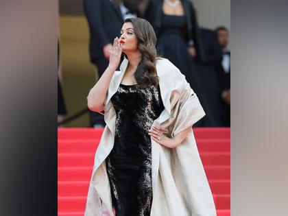 Aishwarya Rai Bachchan dons cape featuring Bhagavad Gita Shloka, adds depth of Indian wisdom to exuberance of Cannes | Aishwarya Rai Bachchan dons cape featuring Bhagavad Gita Shloka, adds depth of Indian wisdom to exuberance of Cannes Aishwarya Rai Bachchan dons cape featuring Bhagavad Gita Shloka, adds depth of Indian wisdom to exuberance of Cannes | Aishwarya Rai Bachchan dons cape featuring Bhagavad Gita Shloka, adds depth of Indian wisdom to exuberance of Cannes